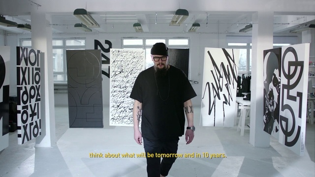 Video Reference: Automotive design, Sleeve, Fashion design, Flooring, Floor, T-shirt, Event, Art, Ceiling, Font