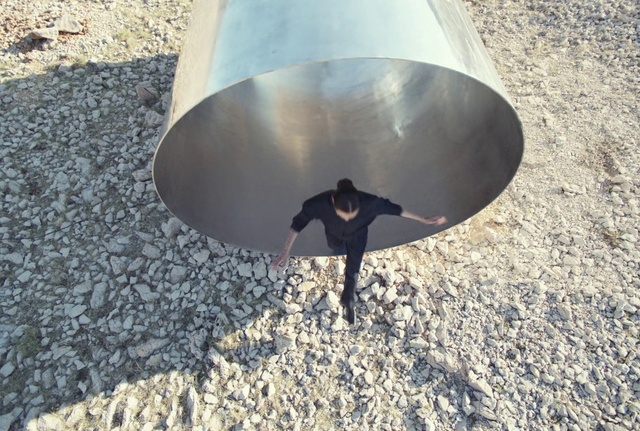 Video Reference: Street light, Road surface, Asphalt, Shade, Plant, Tints and shades, Art, Musical instrument, Tree, Concrete