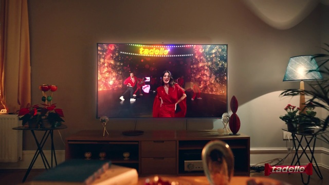 Video Reference: Entertainment, Lighting, Plant, Interior design, Living room, Flat panel display, Television set, Art, Couch, Display device