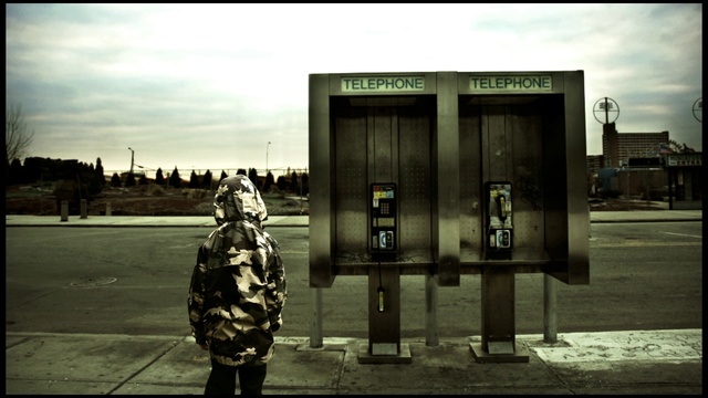 Video Reference: Cloud, Sky, Telephone booth, Payphone, Standing, Black-and-white, Style, Wall, Jacket, Gas