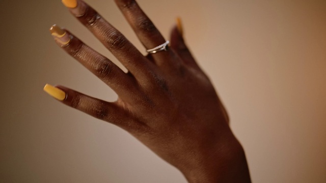 Video Reference: Sky, Gesture, Nail, Finger, Thumb, Body jewelry, Nail polish, Nail care, Wrist, Service