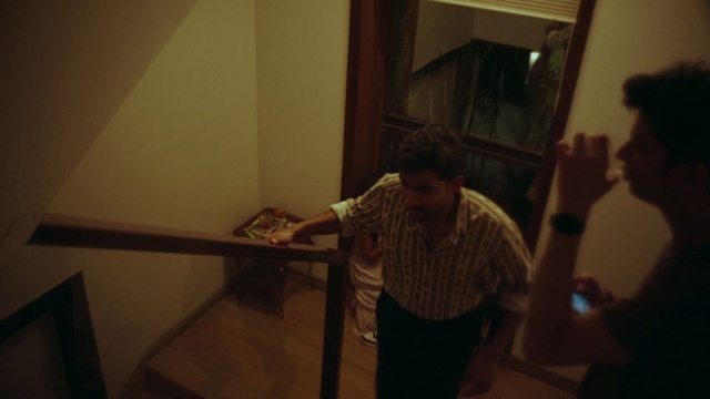 Video Reference: Hat, Gesture, Wood, Event, T-shirt, Fun, Darkness, Visual arts, Entertainment, Room