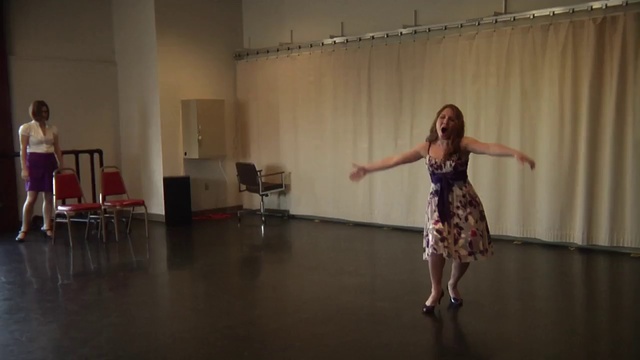 Video Reference: Shoulder, Dance, Flash photography, Performing arts, Entertainment, Floor, Flooring, Curtain, Performance art, Choreography