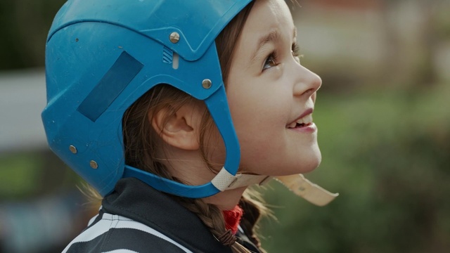 Video Reference: Sports gear, Helmet, Happy, Cap, Headgear, Flash photography, Fun, Leisure, Recreation, Personal protective equipment