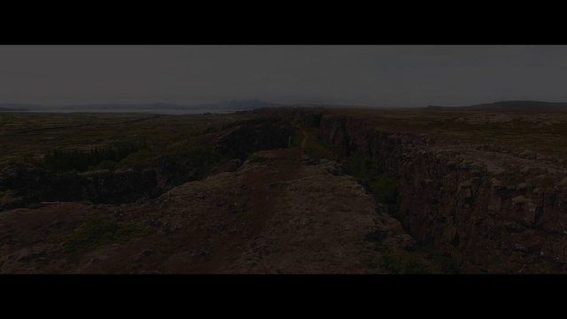 Video Reference: Terrain, Slope, Landscape, Road, Grassland, Horizon, Bedrock, Grass, Hill, Soil