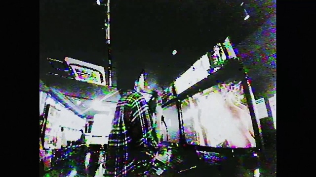 Video Reference: Purple, Electricity, Font, Building, Magenta, Event, Midnight, Rectangle, Display device, Darkness
