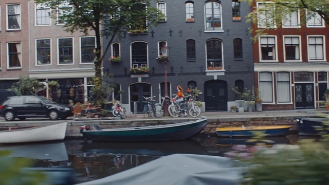 Video Reference: Water, Boat, Window, Watercraft, Vehicle, Daytime, Building, Plant, Wheel, Tree