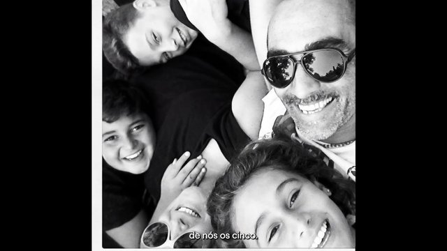 Video Reference: black and white, selfie, group photo, friends, smiling, overhead shot, casual, people, portrait, family, close up, outdoors