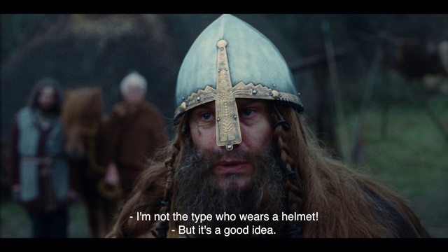 Video Reference: Beard, Cap, Facial hair, Moustache, Helmet, Event, Fashion accessory, Personal protective equipment, History, Wrinkle