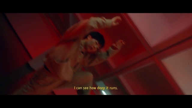 Video Reference: Flash photography, Pink, Font, Performing arts, Magenta, Entertainment, Event, Chest, Darkness, Barechested