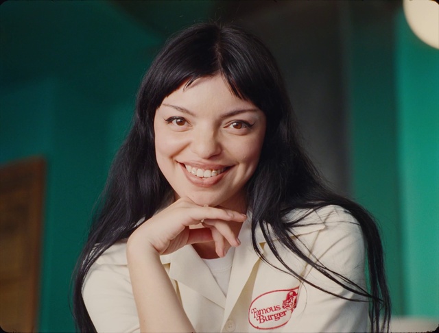 Video Reference: Cheek, Smile, Skin, Eyebrow, Eyelash, Sleeve, Flash photography, Gesture, Happy, Black hair