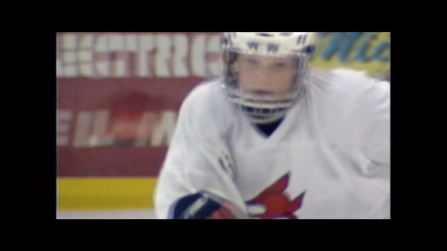 Video Reference: Sports uniform, Jersey, Sports gear, Helmet, Player, Font, Sportswear, Display device, Art, T-shirt