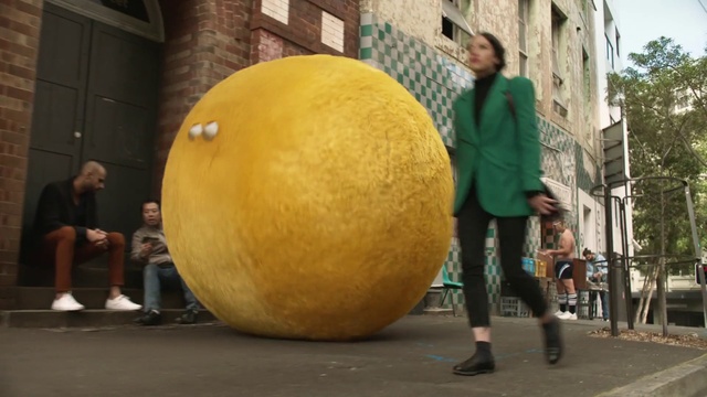 Video Reference: Leg, Orange, Street fashion, Art, Tree, Road surface, Asphalt, Fun, Road, Leisure