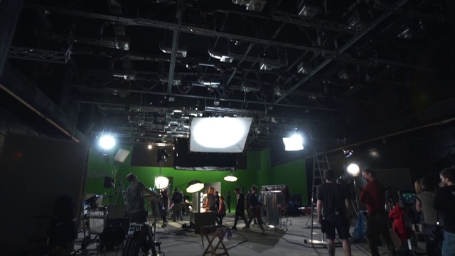 Video Reference: Chair, Entertainment, Building, Performing arts, Event, Music, Stage, Crowd, Gadget, Leisure