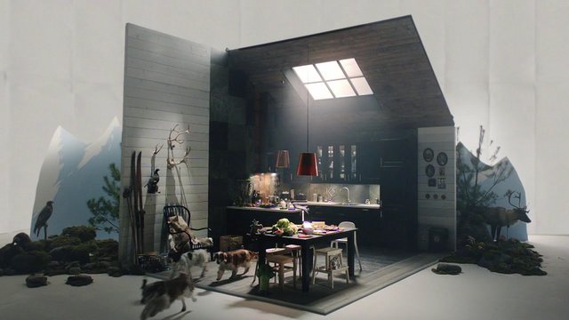 Video Reference: interior, kitchen, dining room, studio set, skylight, hanging lamp, modern design, miniature set, backdrop, mountains, rocks, animals, tables, chairs, dark interior, art installation