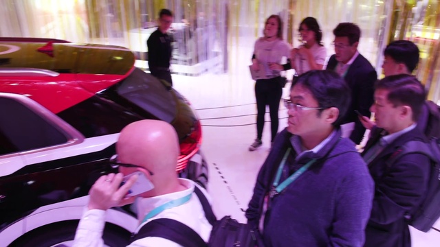 Video Reference: Outerwear, Purple, Coat, Leisure, Magenta, Fun, Event, Curtain, Bag, Automotive design