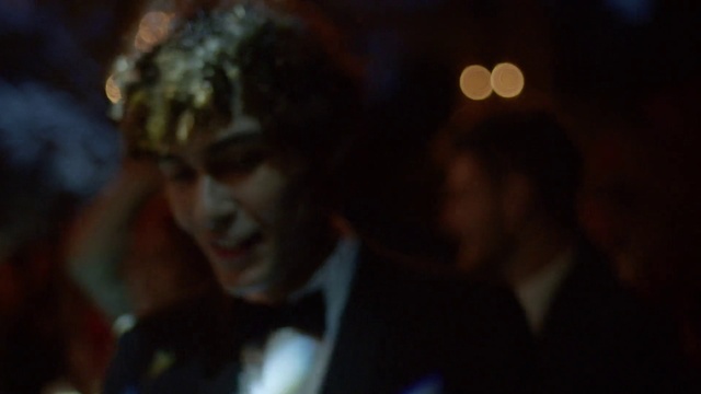 Video Reference: Flash photography, Entertainment, Tie, Suit, Event, Darkness, Fictional character, Formal wear, Midnight, Musician