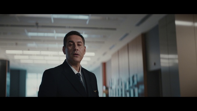 Video Reference: Flash photography, Collar, Sleeve, Blazer, Formal wear, Event, White-collar worker, Suit, Font, Public speaking