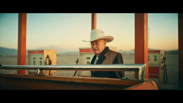 Video Reference: Sky, Hat, Sun hat, Travel, Wood, Landscape, White-collar worker, Suit, Fashion accessory, Formal wear