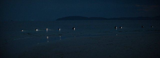 Video Reference: night, seascape, ocean, boats, lights, water, reflection, horizon, distant land, dark, calm, landscape
