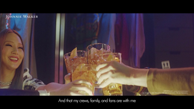 Video Reference: Drinkware, Smile, Purple, Gesture, Finger, Entertainment, Stemware, Font, Drink, Event