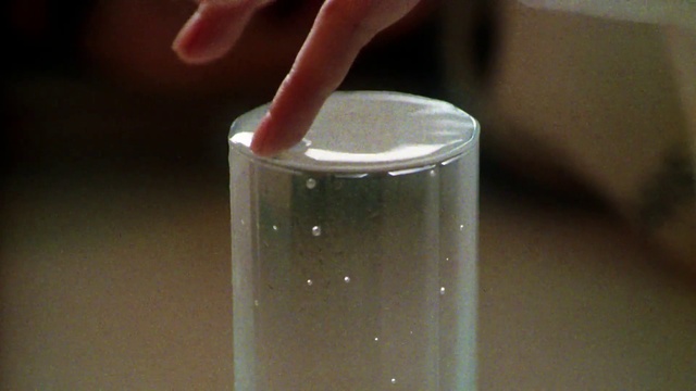 Video Reference: Hand, Liquid, Drinkware, Water, Fluid, Plastic bottle, Solution, Cylinder, Nail, Drink