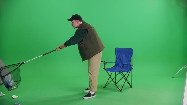 Video Reference: Chair, Elbow, Grass, Cleanliness, Flooring, Balance, Event, Grassland, Electric blue, Golf equipment