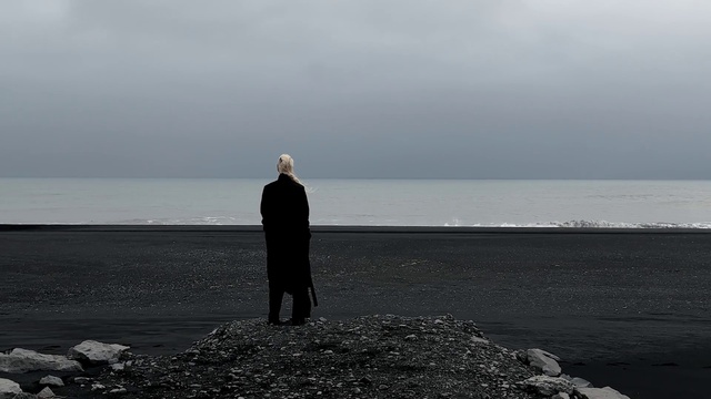 Video Reference: Water, Sky, Outerwear, Cloud, Gesture, Coastal and oceanic landforms, Grey, People in nature, Horizon, Shore