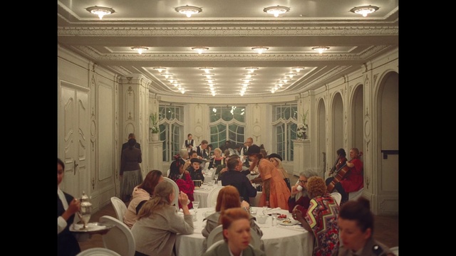 Video Reference: Furniture, Chair, Table, Lighting, Decoration, Interior design, Social group, Hall, Suit, Event