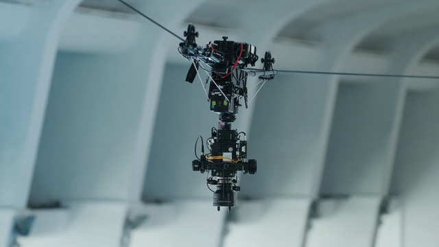 Video Reference: Machine, Aircraft, Art, Fashion accessory, Automotive design, Electric blue, Metal, Ceiling, Light fixture, Engineering