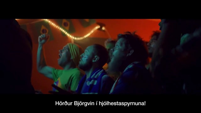 Video Reference: Gesture, Entertainment, Flash photography, Font, Event, Fun, Electric blue, Darkness, T-shirt, Art