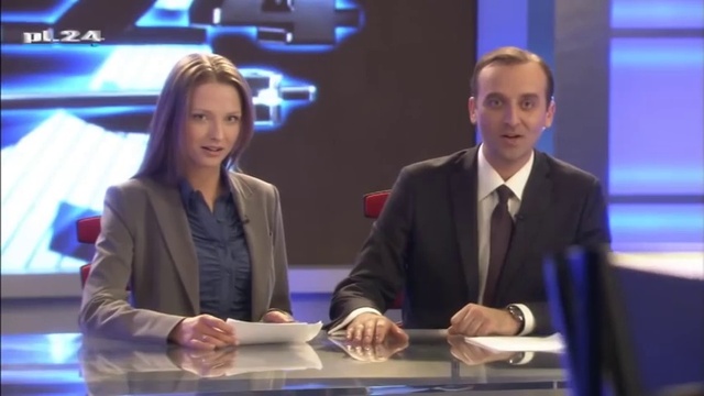 Video Reference: Tie, Coat, Gesture, Television presenter, Spokesperson, Suit, Blazer, White-collar worker, Event, Microphone