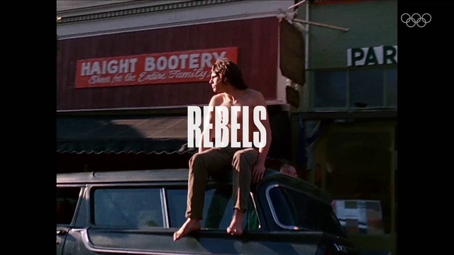 Video Reference: Motor vehicle, Font, Automotive exterior, Automotive design, Signage, T-shirt, Electronic signage, Street fashion, Advertising, Facade