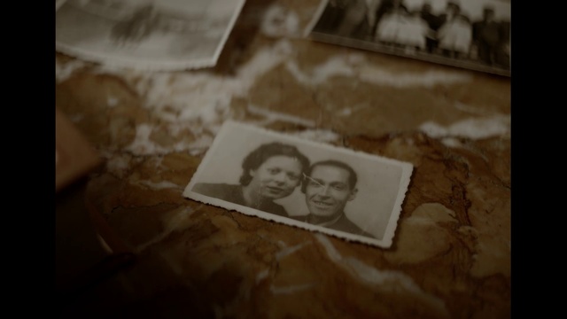 Video Reference: Brown, Rectangle, Wood, Wall, Font, Tints and shades, Room, Visual arts, Paper, Paper product