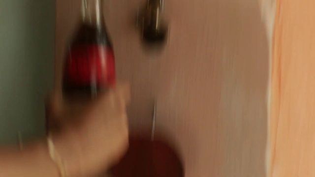 Video Reference: Wood, Gesture, Material property, Flooring, Automotive lighting, Drinkware, Hardwood, Glass bottle, Glass, Magenta