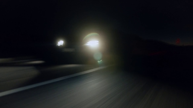 Video Reference: Atmosphere, Automotive lighting, Asphalt, Road surface, Atmospheric phenomenon, Headlamp, Lens flare, Darkness, Midnight, Road