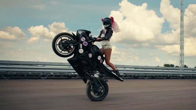 Video Reference: Wheelie, Cloud, Tire, Sky, Wheel, Sports equipment, Vehicle, Automotive tire, Motorcycle, Motor vehicle