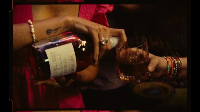 Video Reference: Bottle, Wine, Gesture, Drink, Flash photography, Wrist, Nail, Bangle, Thumb, Event