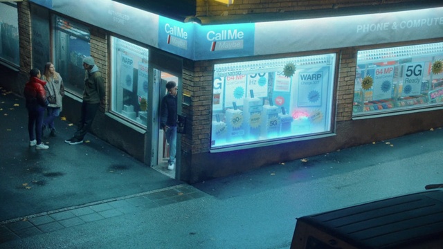 Video Reference: Building, Facade, Flat panel display, Display device, Electronic device, Electric blue, Technology, Television set, Multimedia, Advertising