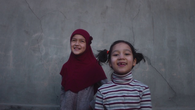 Video Reference: Face, Smile, Eye, Facial expression, Mouth, Flash photography, Temple, Happy, Grey, Style