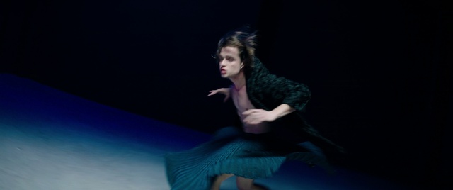 Video Reference: Leg, Human body, Flash photography, Dance, Fashion design, Choreography, Artist, Electric blue, Performing arts, Event