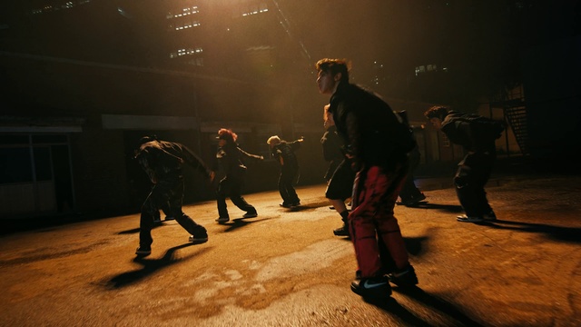 Video Reference: Standing, Entertainment, Tints and shades, Fun, Performing arts, Event, Asphalt, Darkness, Midnight, Crowd