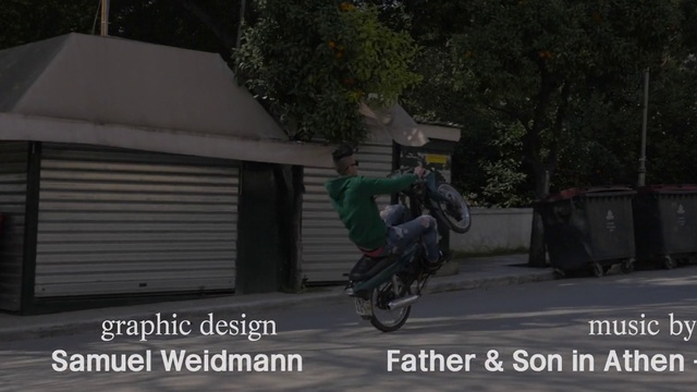 Video Reference: Tire, Wheel, Vehicle, Automotive tire, Motorcycle, Asphalt, Rolling, Tree, Stunt performer, Motor vehicle