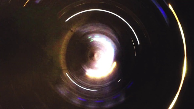 Video Reference: Camera lens, Circle, Gas, Space, Symmetry, Auto part, Entertainment, Musical instrument, Electric blue, Darkness