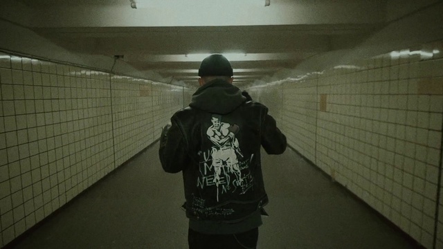 Video Reference: Flash photography, Standing, Grey, Atmospheric phenomenon, Cap, Tints and shades, Sky, Baseball cap, Darkness, Flooring