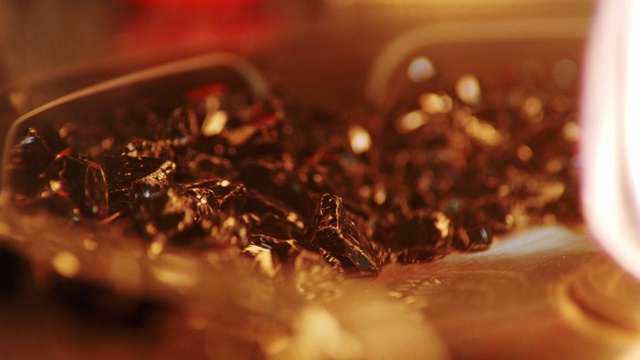 Video Reference: Brown, Liquid, Amber, Fluid, Cuisine, Drink, Dish, Ingredient, Metal, Chemical compound