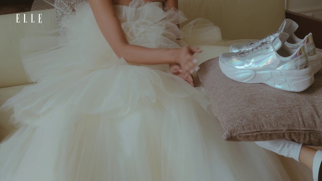 Video Reference: Clothing, Joint, Wedding dress, Shoulder, Dress, Embellishment, Bridal clothing, Fashion, Bride, Bridal party dress