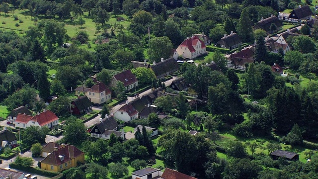 Video Reference: Building, Daytime, Property, Plant, House, Tree, Urban design, Architecture, Land lot, Vegetation