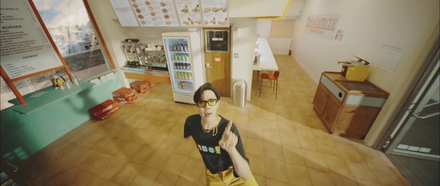 Video Reference: Building, Shorts, House, Table, Wood, Interior design, Yellow, Floor, Flooring, Real estate