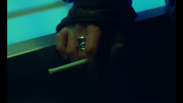 Video Reference: Automotive lighting, Eyewear, Wrist, Gadget, Nail, Electric blue, Audio equipment, Recreation, Personal protective equipment, Fun